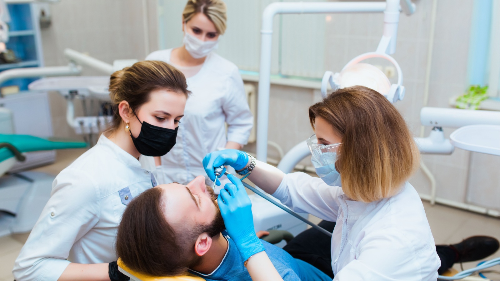 Patient being treated at a dentist school.