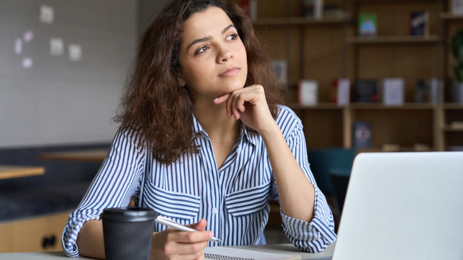 Woman using laptop for budget