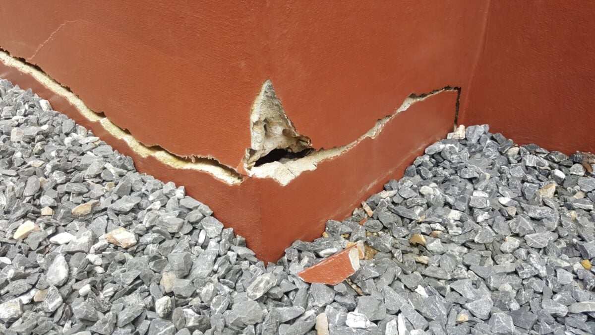 close-up house foundation cracks worry.