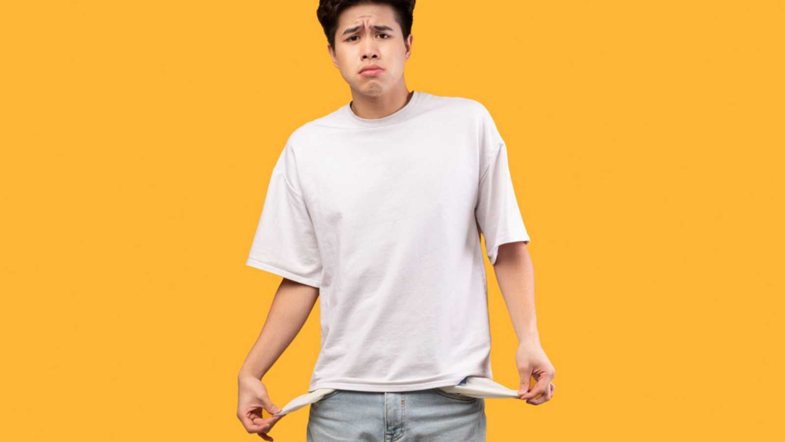 Man showing empty pocket.