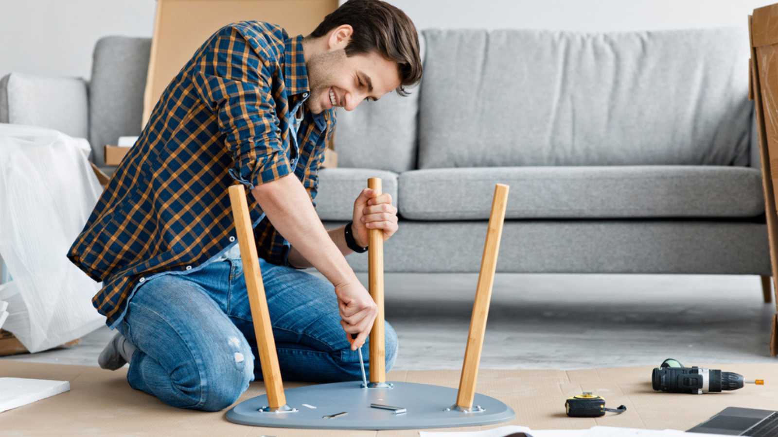 Man fixing furniture