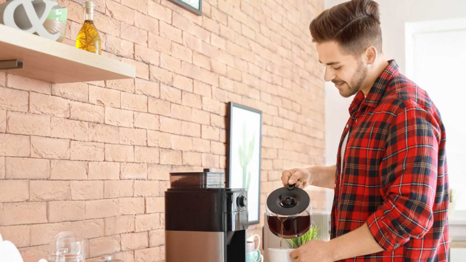 Man making coffee at home