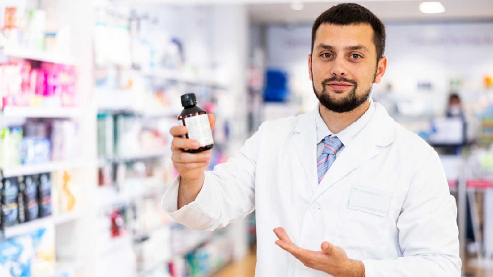 Man with tablet bottle