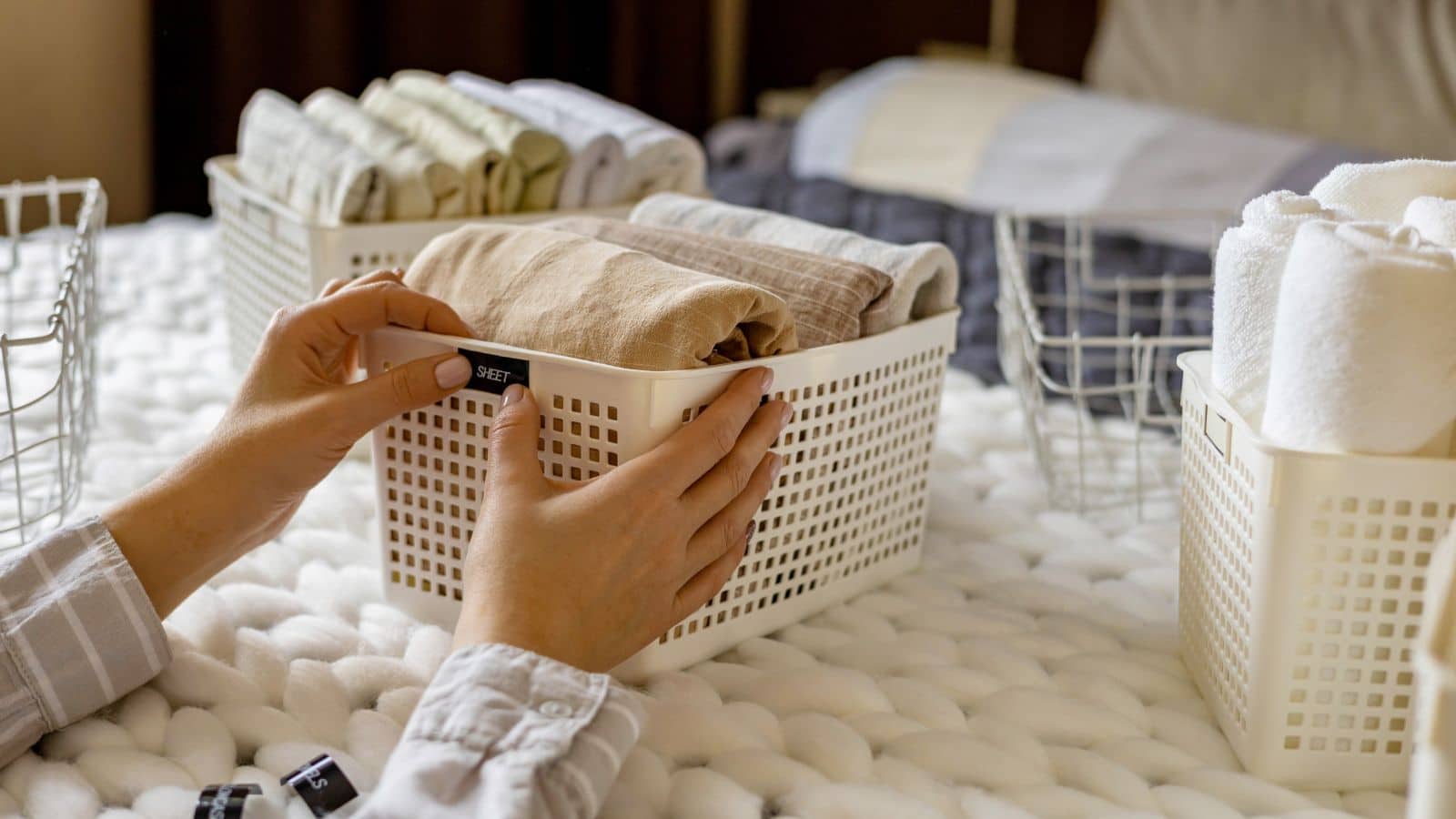 bathroom towel, basket, bed, bedroom, blanket, box, clear out, closeup, duvet, folded, general cleaning, hand label, home, household, housekeeping, housework, keeping, kondo, konmary, label, label maker, labeler, linens, mari, marie, mark, marker, mary, name, nordic, organization, organizer, organizing, print, sheet, sorting, space organizer, spring cleaning, sticker, sticking, sticky, storage, tag, tidying up, title, top view, towel, vertical, woman, word