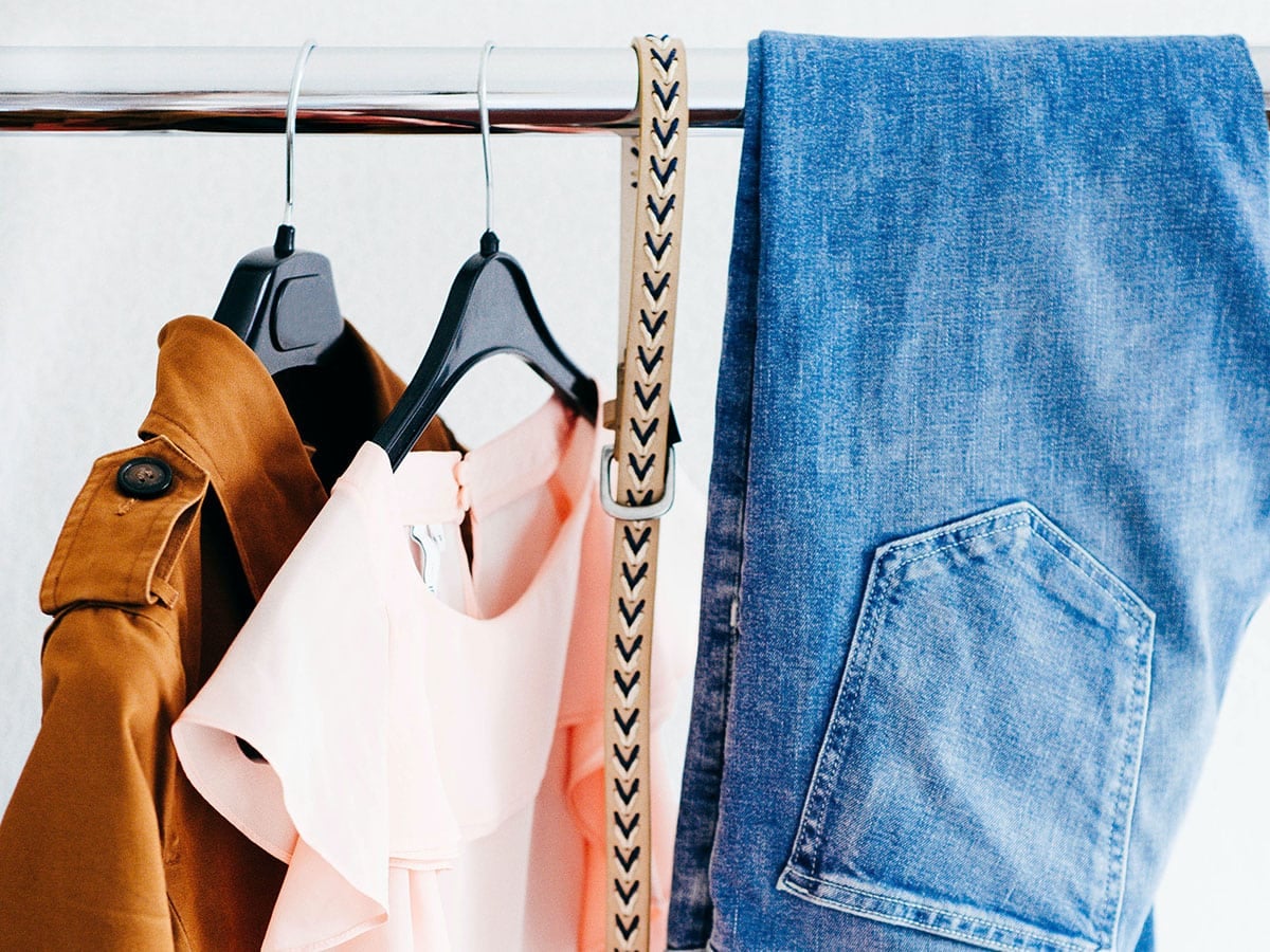 Clothes in closet ready to sell on Poshmark.