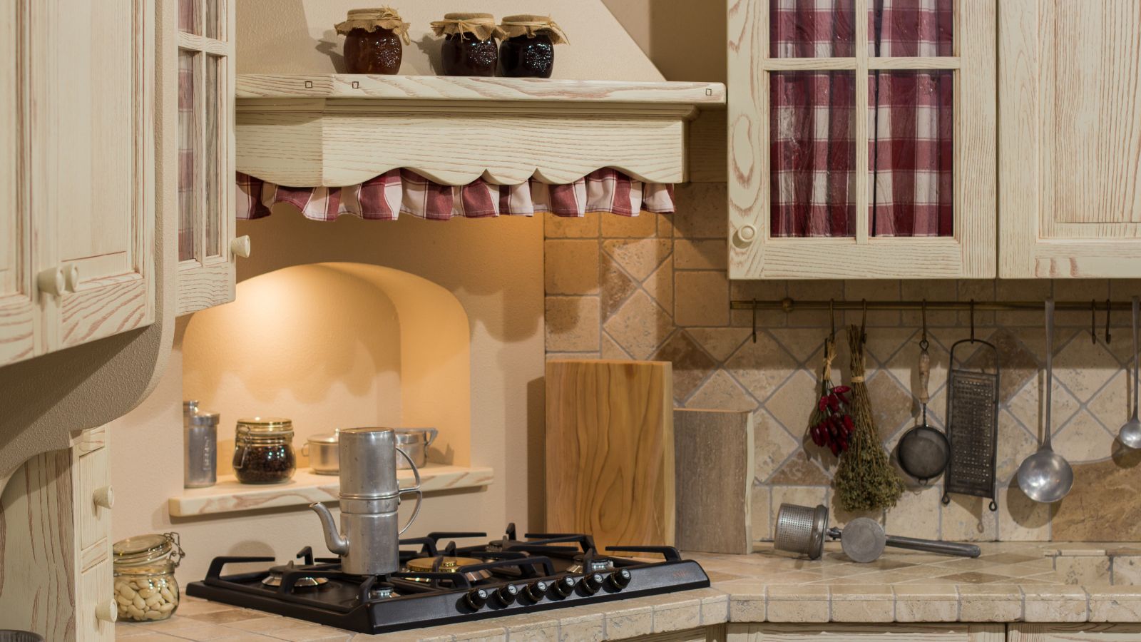 A Dollar-Savvy D&eacute;cor kitchen with inventive ideas and budget-friendly wooden cabinets.