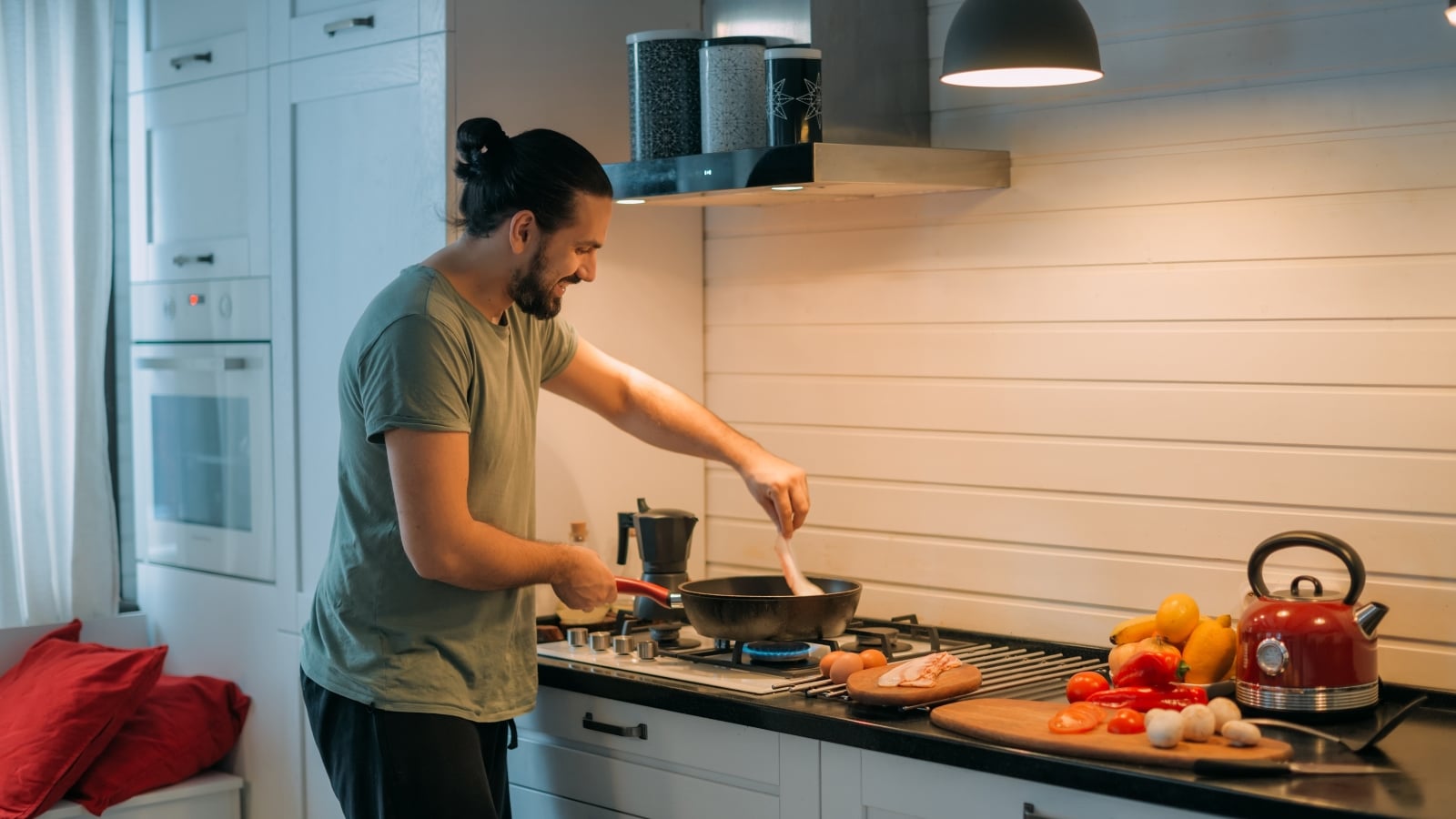 A man is preparing food for a marriage proposal.
